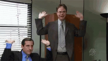 a gif of Michael and Dwight dancing
